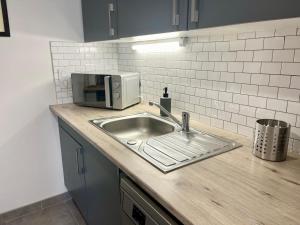 Appartements Le chaurien - central et climatise - local velo : photos des chambres