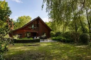 Huswell - Tranquil retreat, cozy chalet in the heart of Urse - Aalter