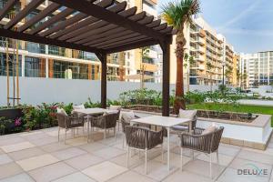 Captivating 1BR Apartment in Azizi Riviera 20, Al Merkadh by Deluxe Holiday Homes
