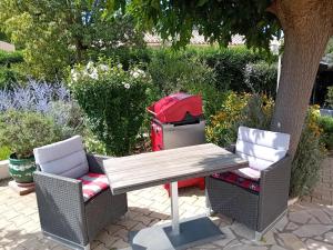 Appartements maison climatisee dans jardin : photos des chambres