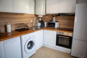 Appartements Confortables - Gare a 5 min pied - 20min de la plage - Terrasse : photos des chambres