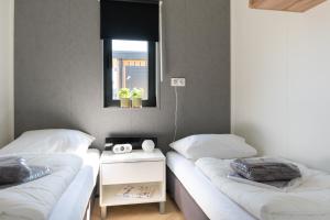 Luxe 4 pers chalet op minicamping in waarde