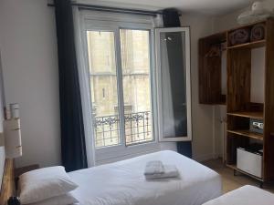 Hotels Hotel De La Perdrix Rouge : photos des chambres