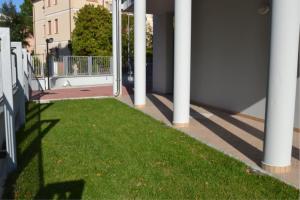 Bright apartment surrounded by greenery