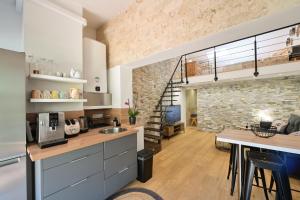 Appartements La ferme Saint-Antoine : photos des chambres