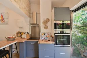 Appartements La ferme Saint-Antoine : photos des chambres