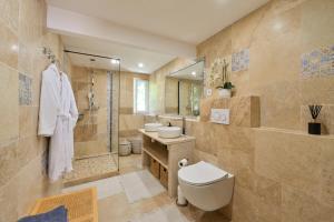 Appartements La ferme Saint-Antoine : photos des chambres