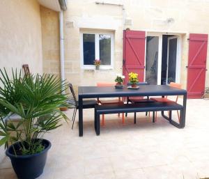 Maison en pierre avec jardin proche de Bordeaux