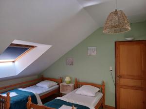 Maisons de vacances Le Bois de Luche : photos des chambres