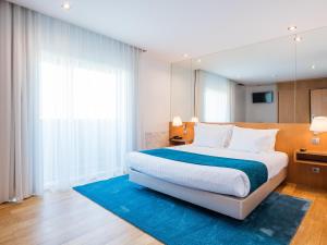 Two-Bedroom Suite room in OPOHOTEL Porto Aeroporto