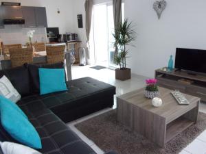 Appartements Les Toiles de Mer : photos des chambres