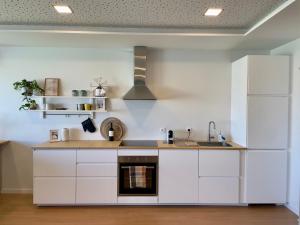 2-bedroom with pool, walk to beach & town