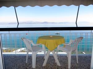 One-Bedroom Apartment with Balcony and Sea View