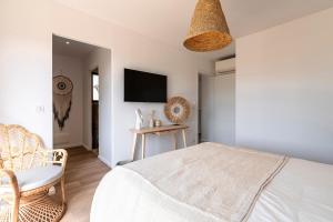 Maisons de vacances Bellezza - Villa climatisee piscine : photos des chambres