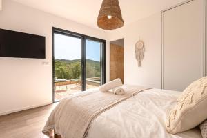 Maisons de vacances Bellezza - Villa climatisee piscine : photos des chambres