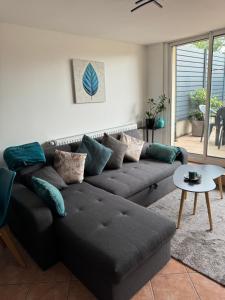 Appartements Au calme dans maison en rez de jardin a 2,2 kms du Groupama stadium et salle LDLC Arena : photos des chambres