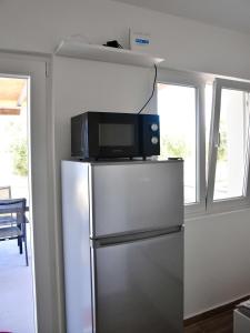 Seaside holiday house Cove Krlic, Pag - 23435