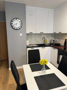 Apartament Grey 2 pokojowy z balkonem w Warszawie