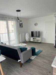 Appartements Appartement F3 cozy avec balcon proche de Paris et aeroport CDG : photos des chambres