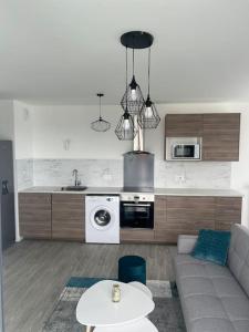 Appartements Appartement F3 cozy avec balcon proche de Paris et aeroport CDG : photos des chambres