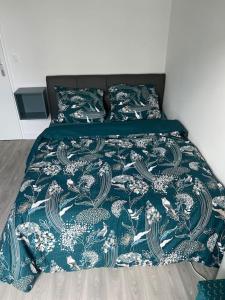 Appartements Appartement F3 cozy avec balcon proche de Paris et aeroport CDG : photos des chambres