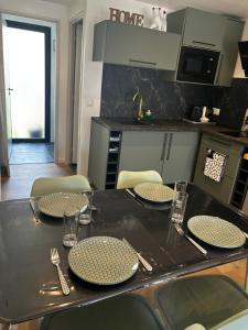 Appartements Logement du Sud avec Jacuzzi : photos des chambres