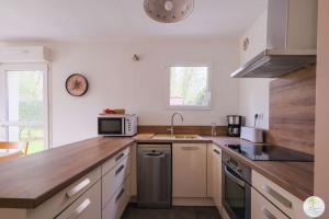 Appartements Appartement Biscarrosse joli T3 avec terrasse et jardin privatif classe 1 etoile : photos des chambres