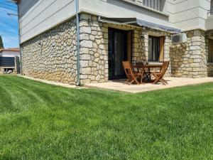 Appartements Quiet apartment in a green setting : photos des chambres
