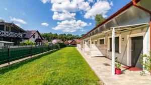 Morskie Domki Apartamentowe by PIAMOLA - Ubytování bez kategorie ve městě Sztutowo