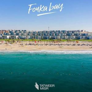 Fouka Bay North Coast 2BRs Modern Style Serviced Apartment with Open Pool & Sea View