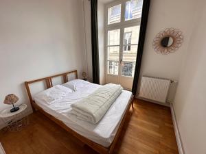 Appartements Appartement coeur de ville : photos des chambres