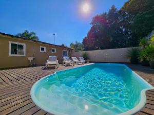 CASA AMBAR COM PISCINA A 400 METROS DA PRAIA DE Mariscal BOMBINHAS N 705