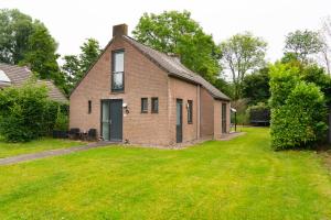 Goldenescape 6P Vip huis met Royale tuin en hottub 110