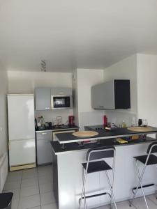 Appartements La Cachette Ludique : photos des chambres