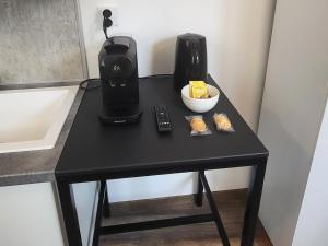 Appartements Appartement 2 Coin cuisine, coin chambre, salle de bain : photos des chambres