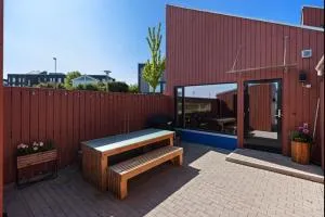 Terraced house with carport and sunny outdoor areas - Randaberg