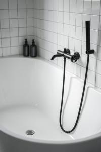 Celý apartmán v rodinném domě s vanou a krbem