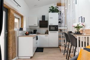 Appartements Aux Pierres Dorees 10 min centre de Lyon : photos des chambres