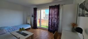 Sejours chez l'habitant Chambre avec balcon RER A 20mn de Paris ou Disneyland : photos des chambres