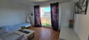 Sejours chez l'habitant Chambre avec balcon RER A 20mn de Paris ou Disneyland : photos des chambres