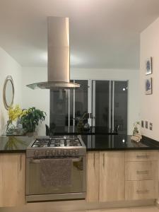 Acogedora y amplia casa, alberca climatizada previa reserva