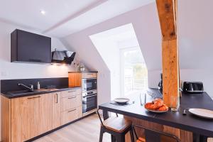 Appartements Les Vosges : photos des chambres