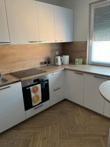 Apartament 55 z miejscem w garażu
