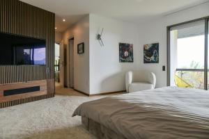 Villas Superbe villa avec piscine interieure, sauna, jacuzzi et salle de sport : photos des chambres