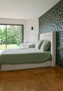 Villas Superbe villa avec piscine interieure, sauna, jacuzzi et salle de sport : photos des chambres