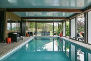 Villas Superbe villa avec piscine interieure, sauna, jacuzzi et salle de sport : photos des chambres