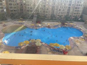 شاليه ٣ غرف وصالة بقرية اكوا فيو الساحل الشمالي