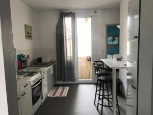 Appartements Charmant appartement proche de la rue Saint Jean : photos des chambres