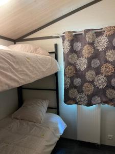 Chalets Chalet de la plage : photos des chambres