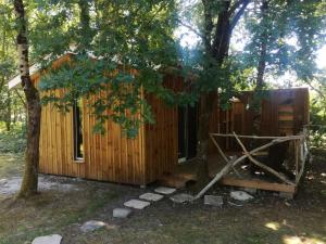 Appartements JOLIE CABANE BOIS SOUS LES CHENES Hourtin bourg : photos des chambres
